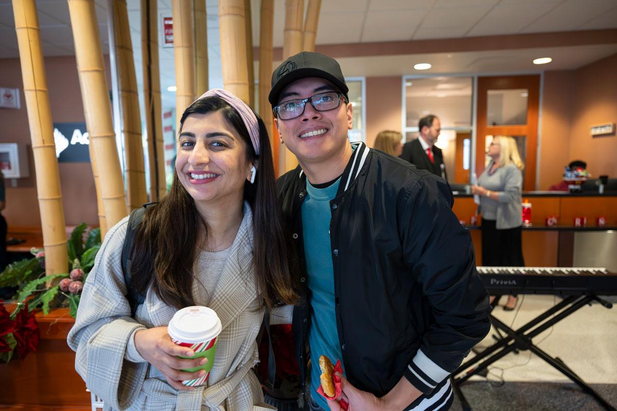 guests-smiling-at-tree-lighting-ceremony