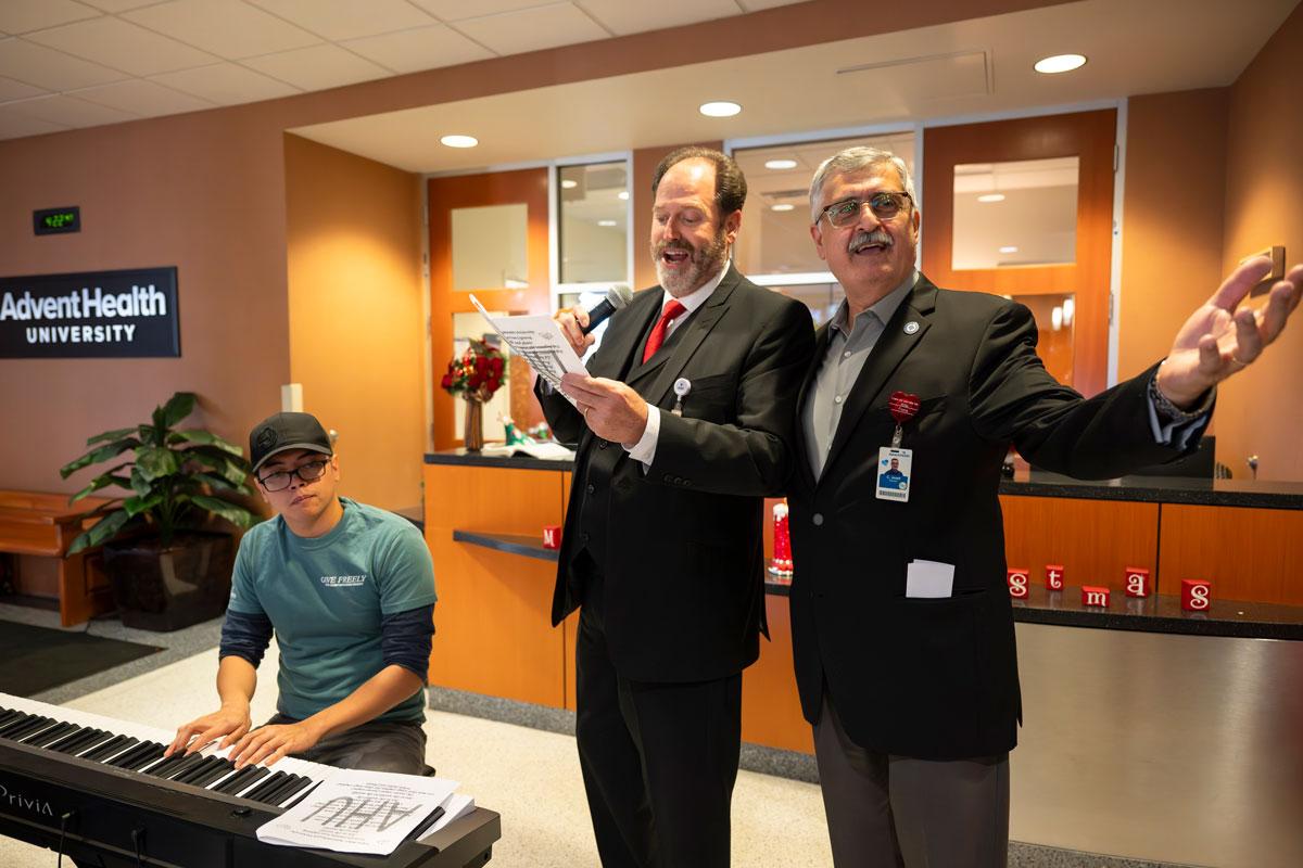Lonnie-Mixon-and-Dr. Ghosn-singing-Christmas-carols