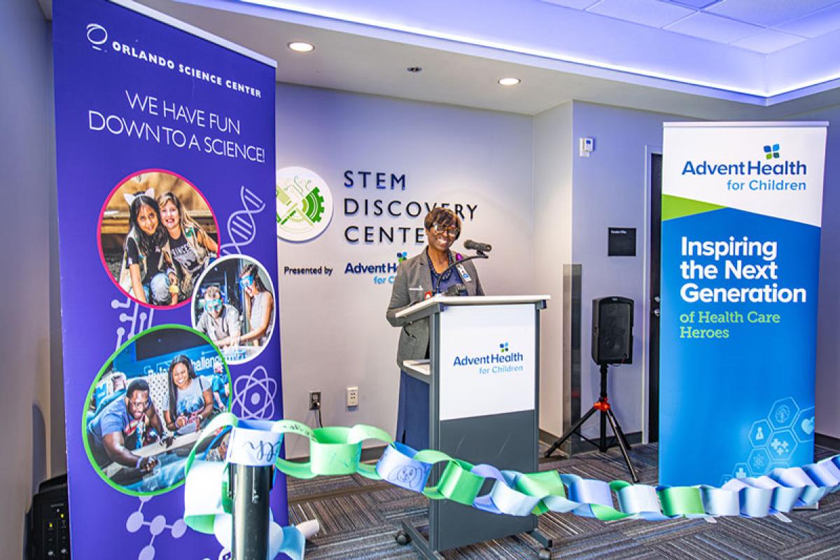 Provost Karen Benn Marshall smiling at an event at the Orlando Science Center