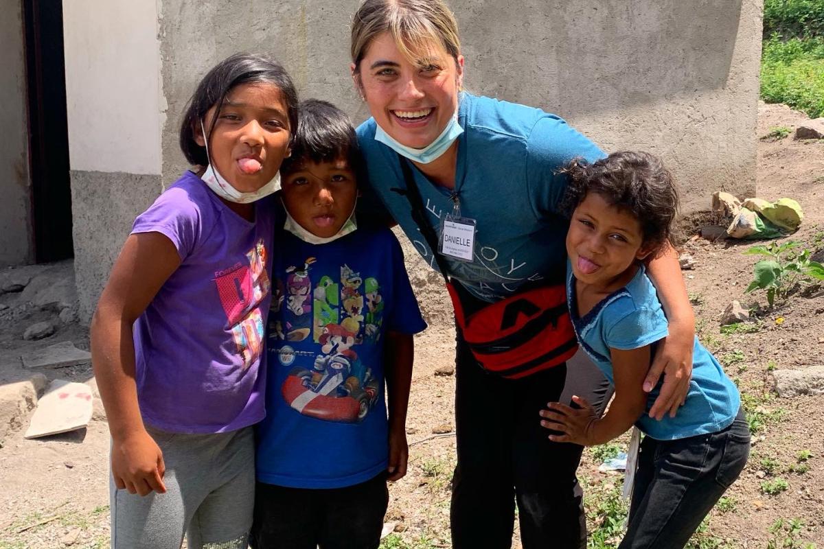 A physical therapy student with the Honduran children