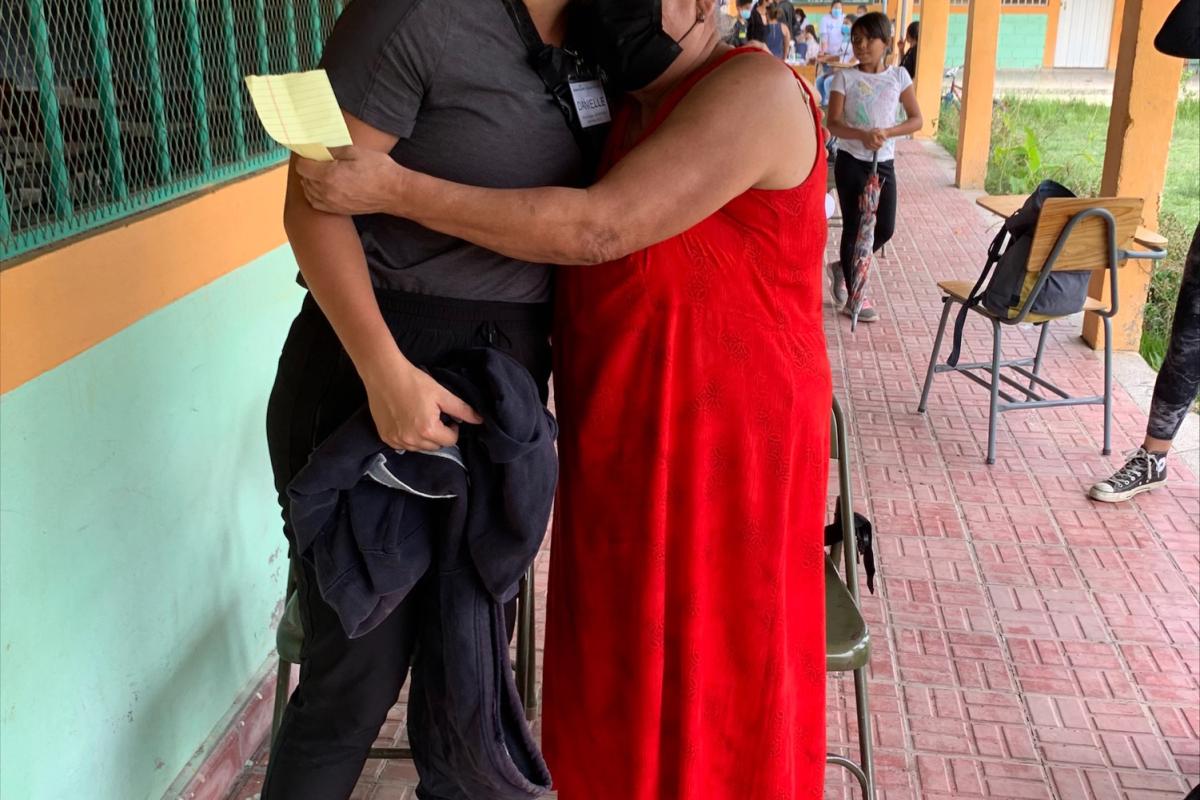 A physical therapy student with an elderly Honduran woman