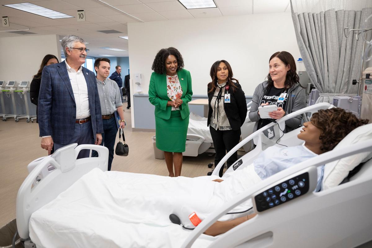 Guests touring the AHU Tampa nursing lab.