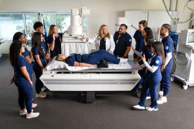 Group of students with professor in radiography lab