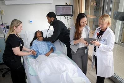 Physician assistant students participate in a hospital floor simulation