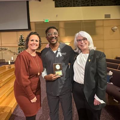John Itoe with Nursing faculty members at the nursing pinning ceremony