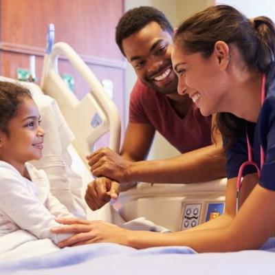 nurse-comforts-pediatric-patient