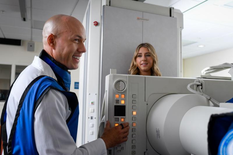 Professor and student in radiography lab