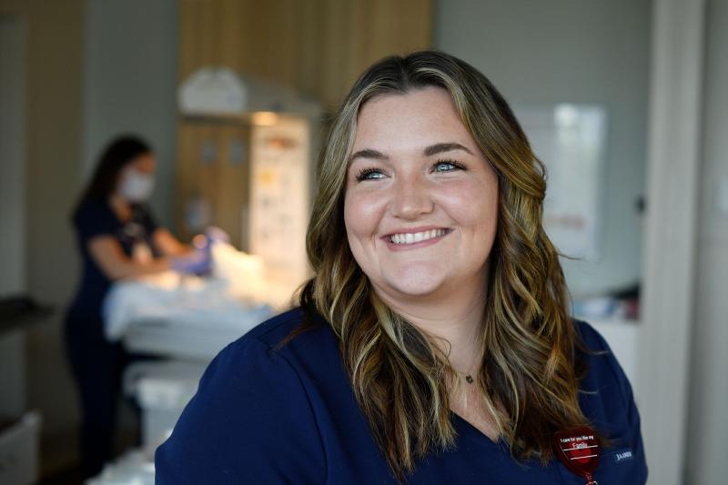 A female nurse smiling