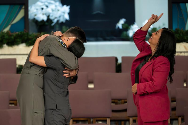 Isabella Rodriguez hugging her brother
