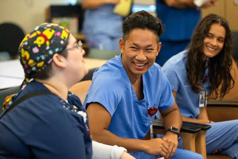 Nursing interns conversing with each other