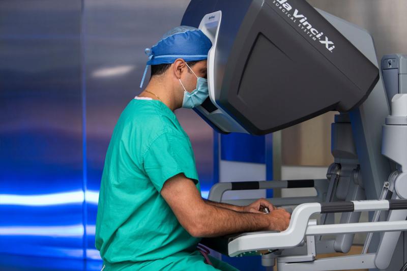 A doctor performing robotic surgery