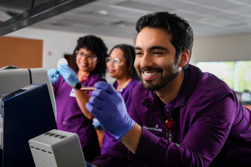 students in lab smiling