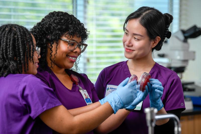 students in lab smiling