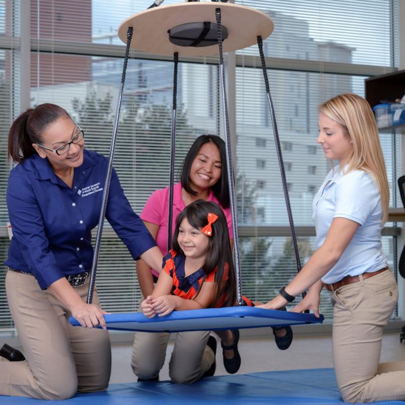 Occupational Therapy Students and Child