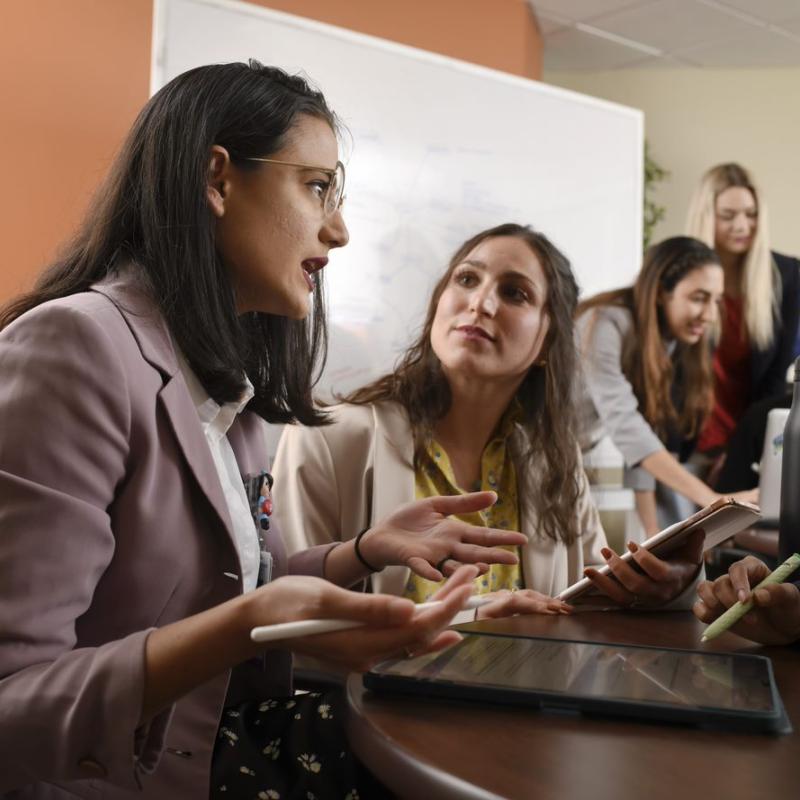 AHU Students collaborating on an assignment