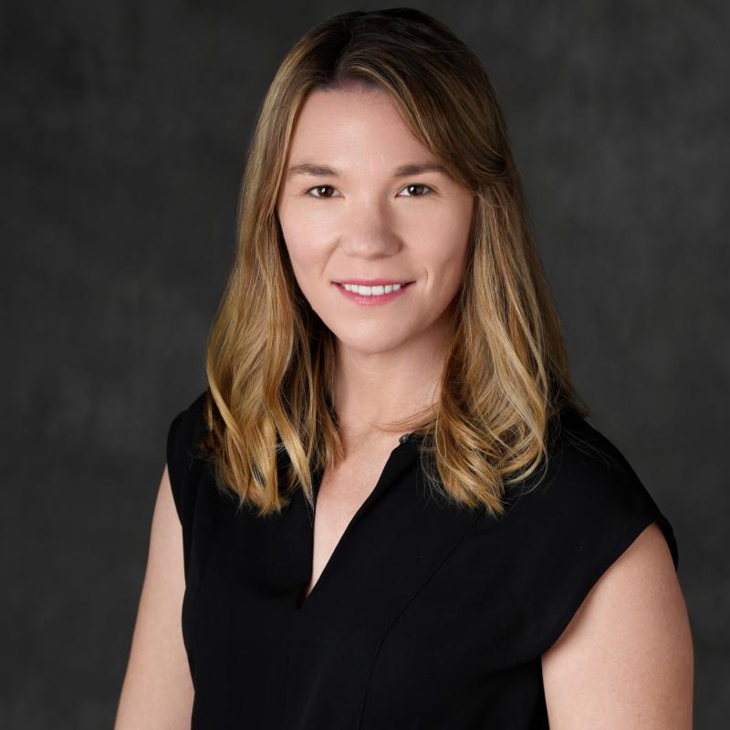 faculty member smiling