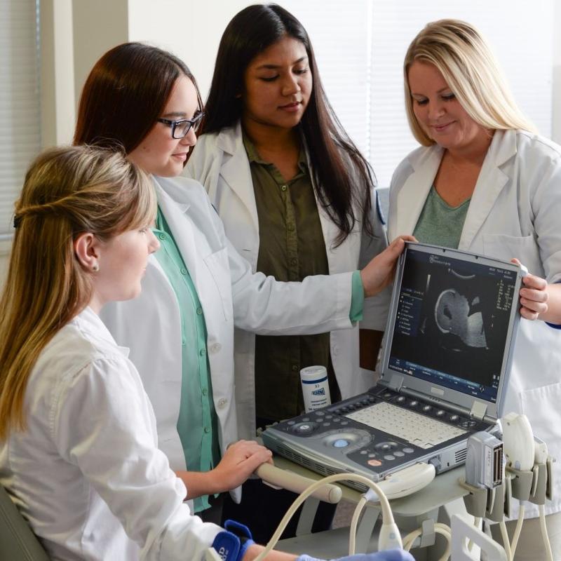Four Sonography Students in Learning Lab