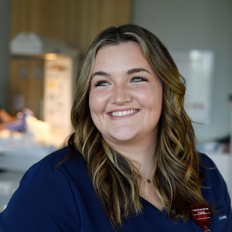 A female nurse smiling