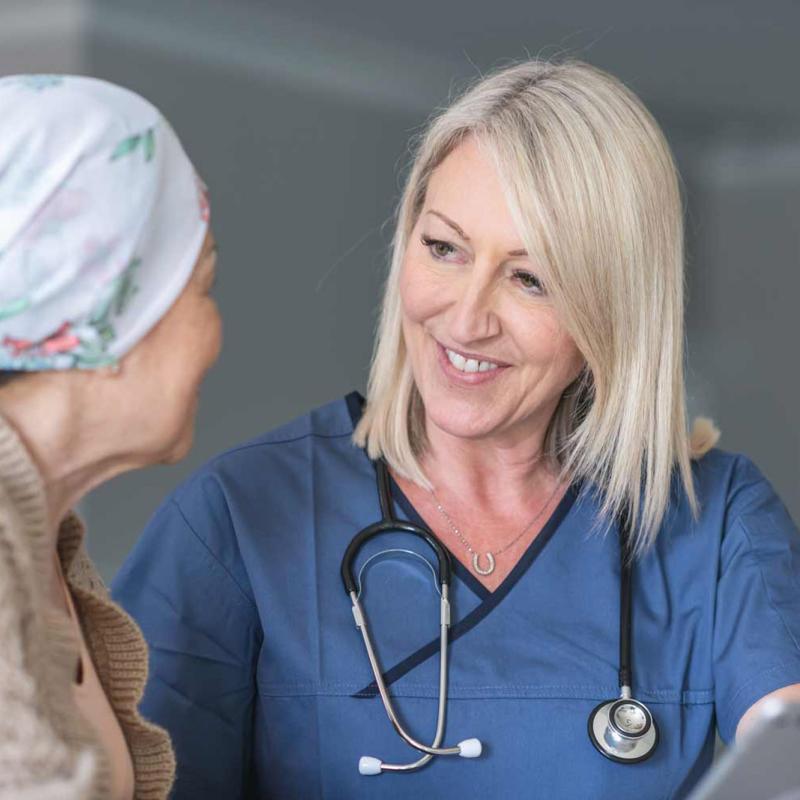 Nurse with cancer patient
