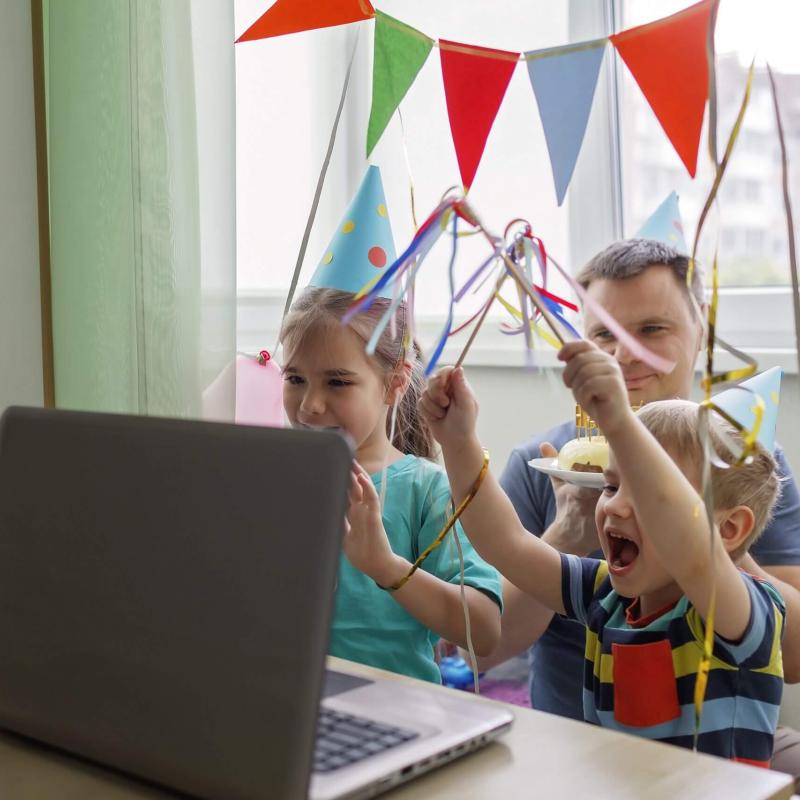 Childrens birthday party with laptop