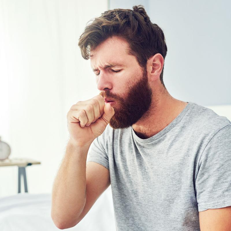 Man coughing
