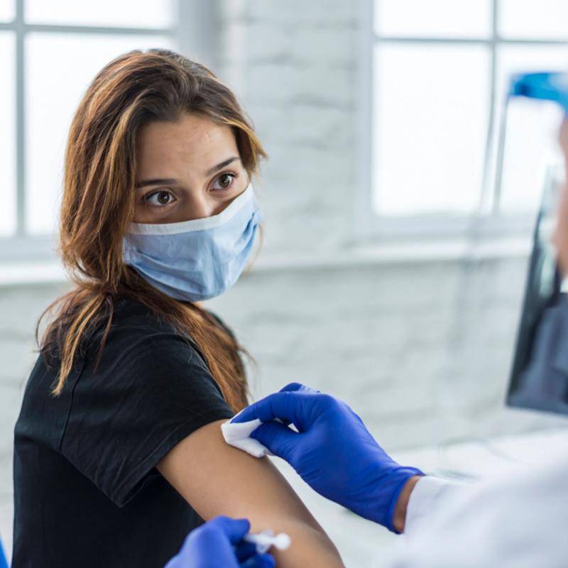 Woman getting a vaccine