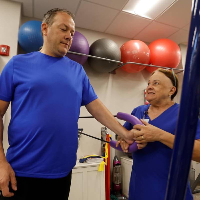 A patient works with an occupational therapist at the Hope Clinic