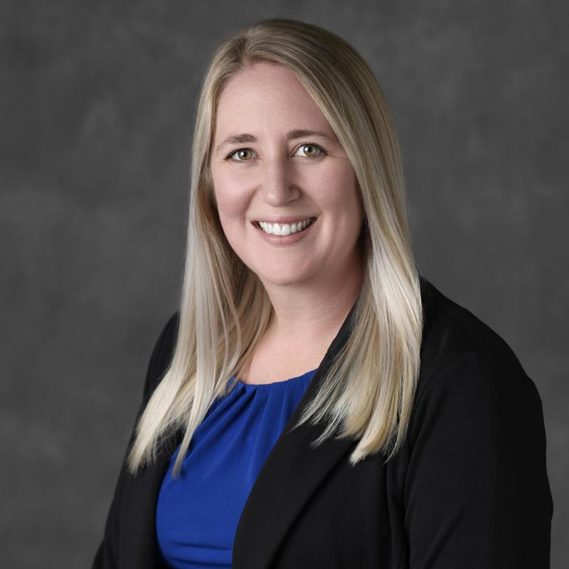 Headshot of faculty member Jozie Gold smiling