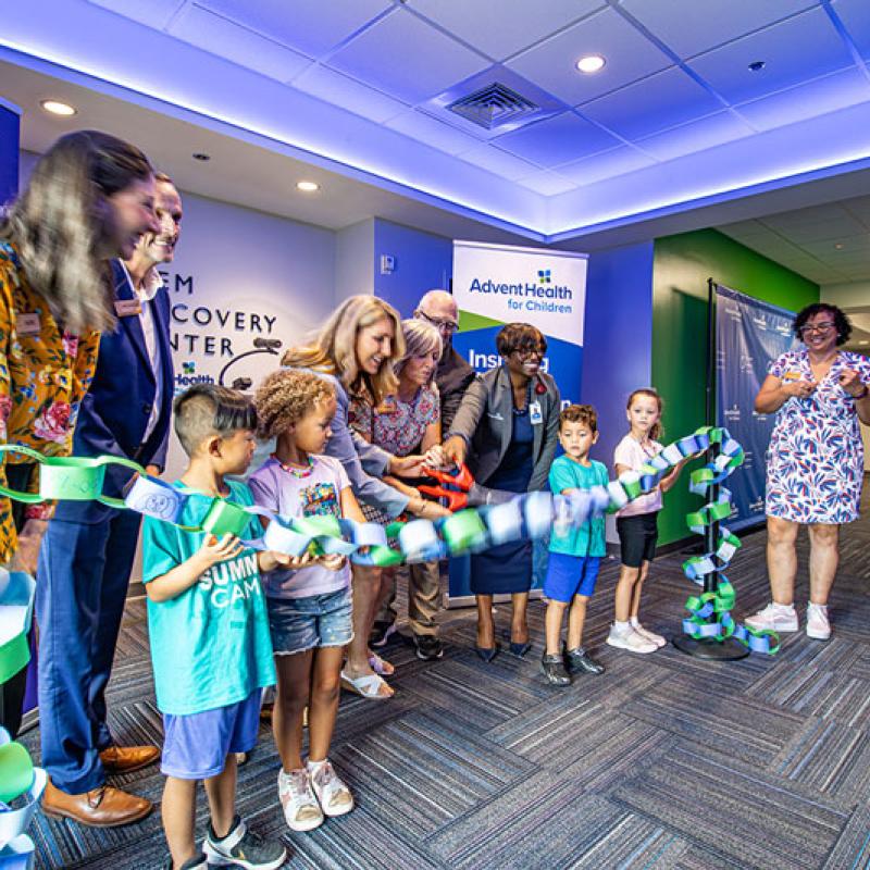 Group of people celebrating an event at the Orlando Science Center