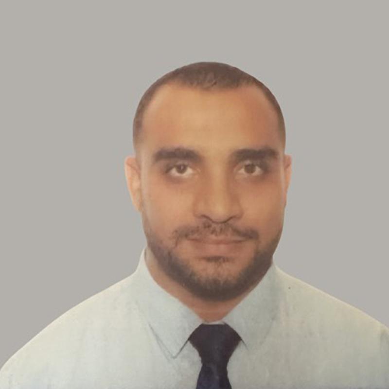 Image of faculty member smiling