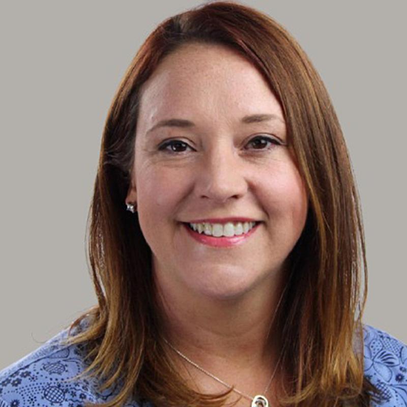 Image of faculty member smiling
