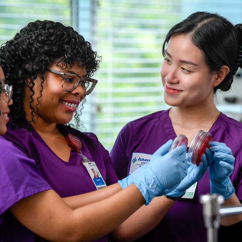 students in lab smiling