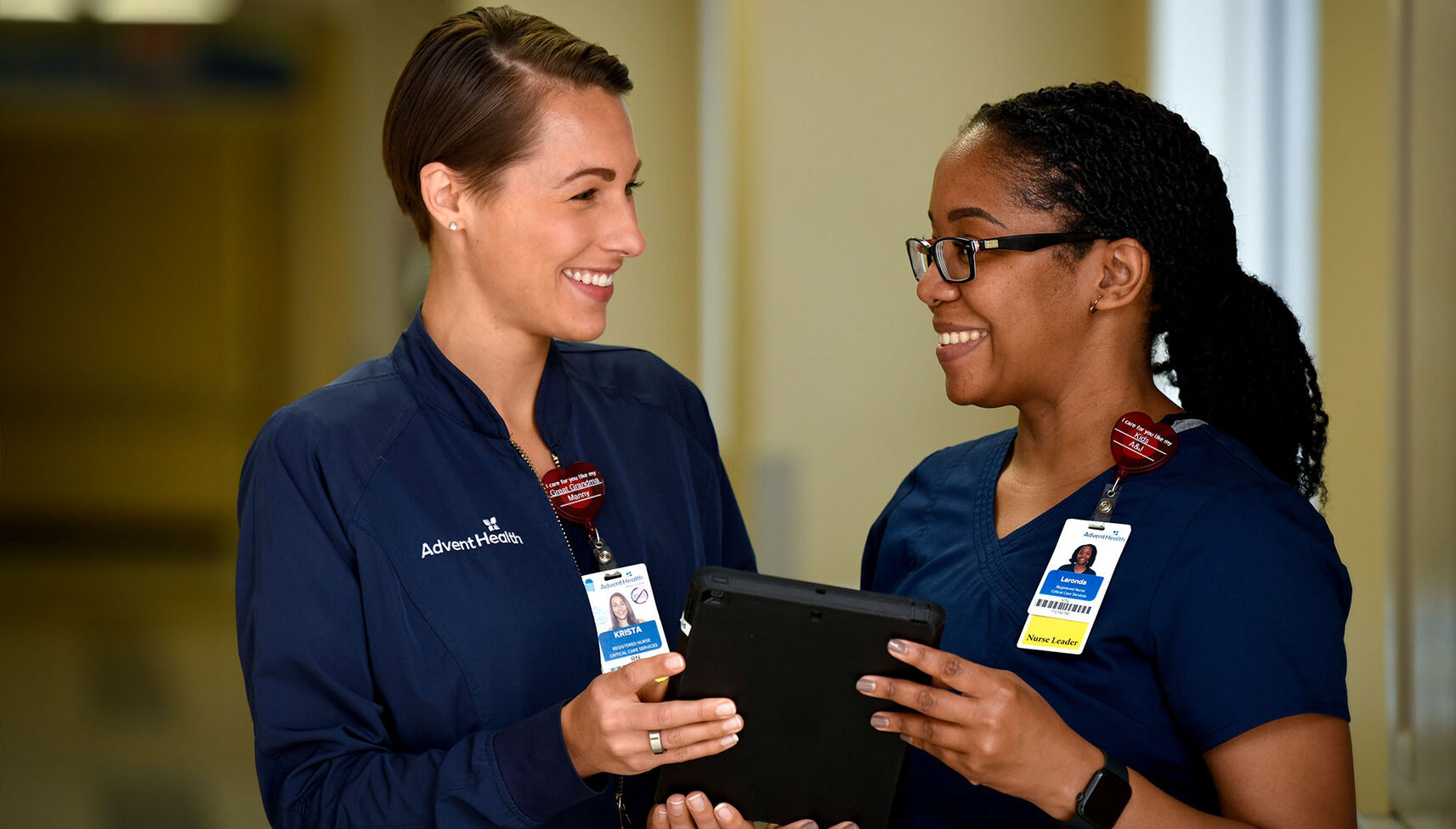 Two young female nurses working together in a hospital