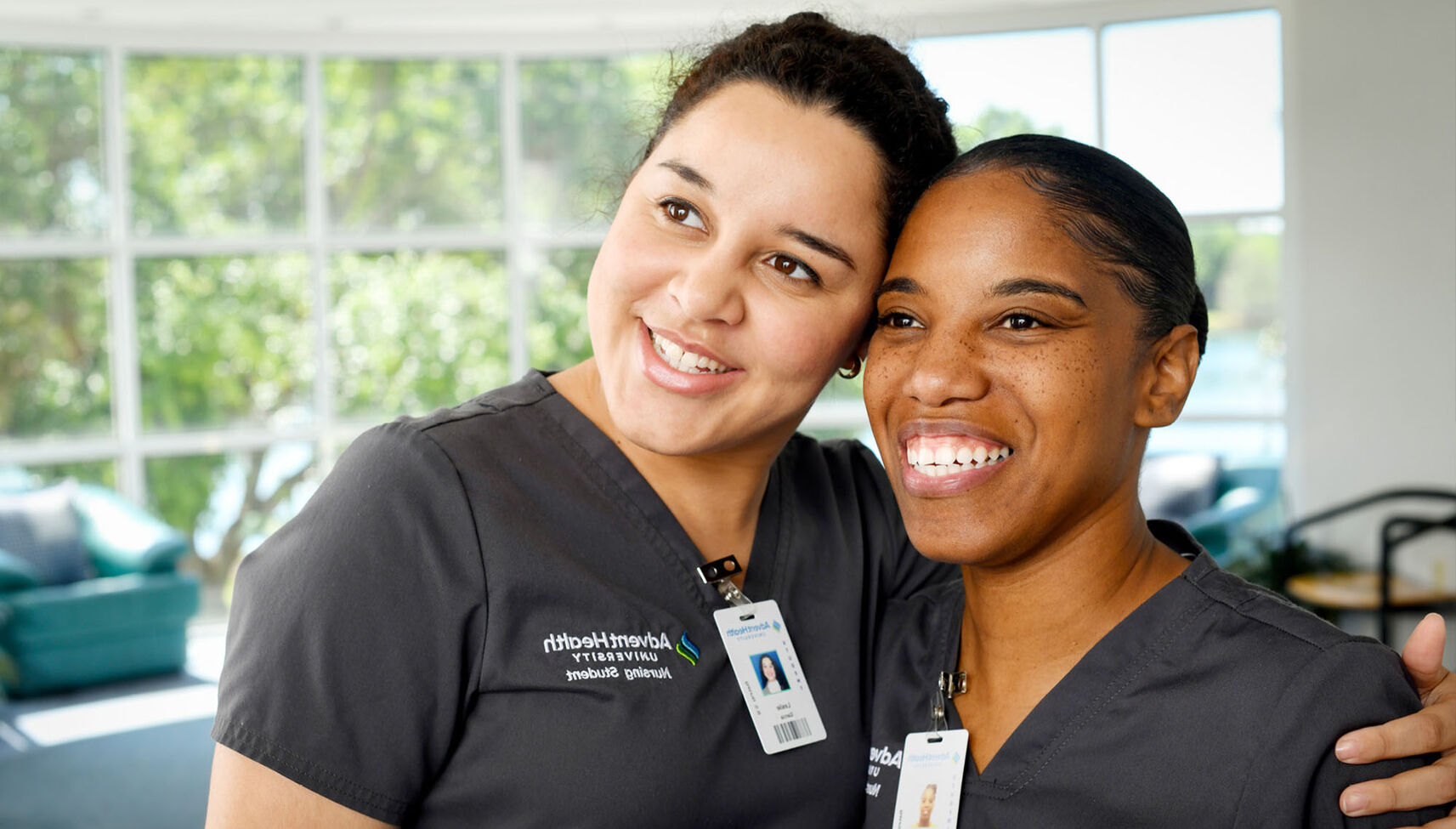 Two nursing students with their arm around each other