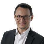 smiling healthcare administration faculty member