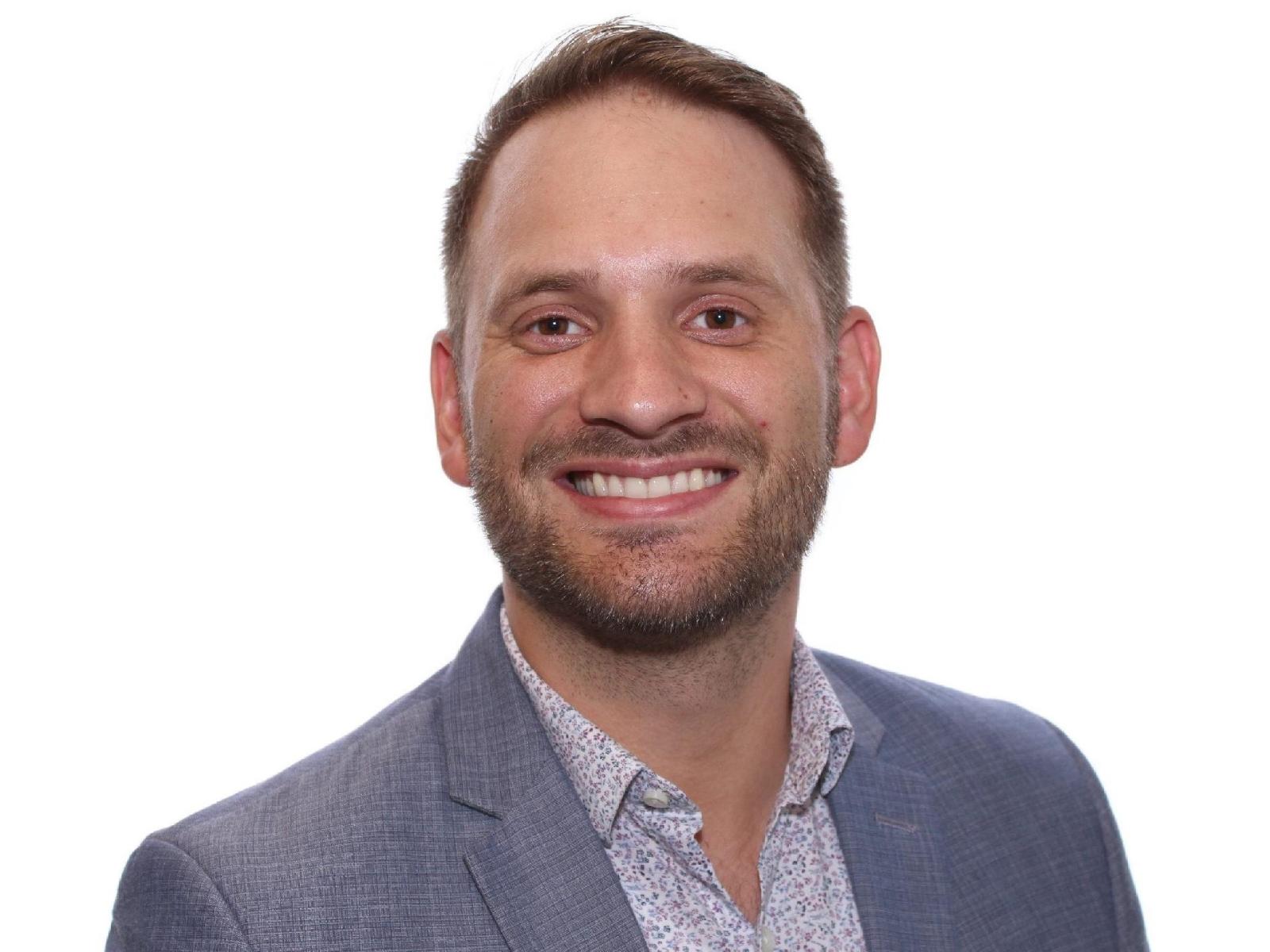 image of chief operating office smiling