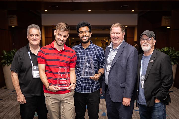 AHU and Fullsail team members poser with awards