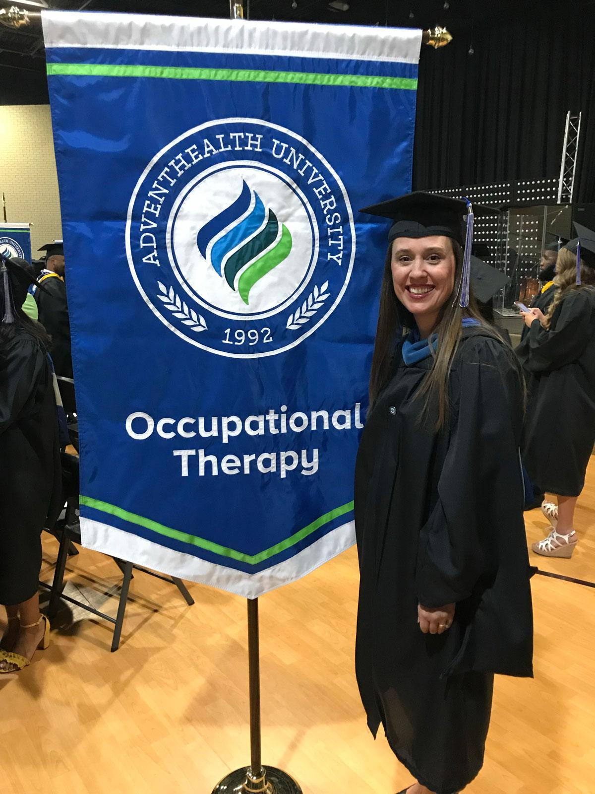 Image of Bryn Nadeau a graduate of the occupational therapy program in regalia.