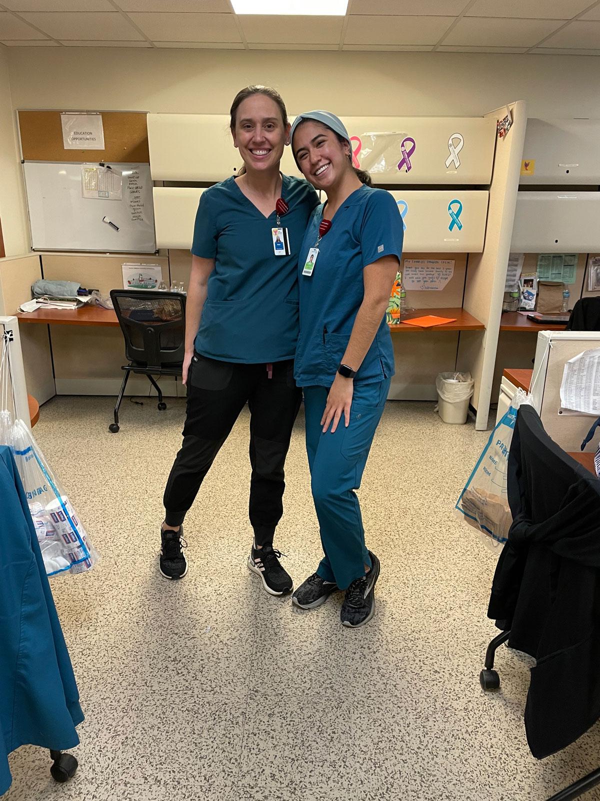 Two occupational therapists smiling at work