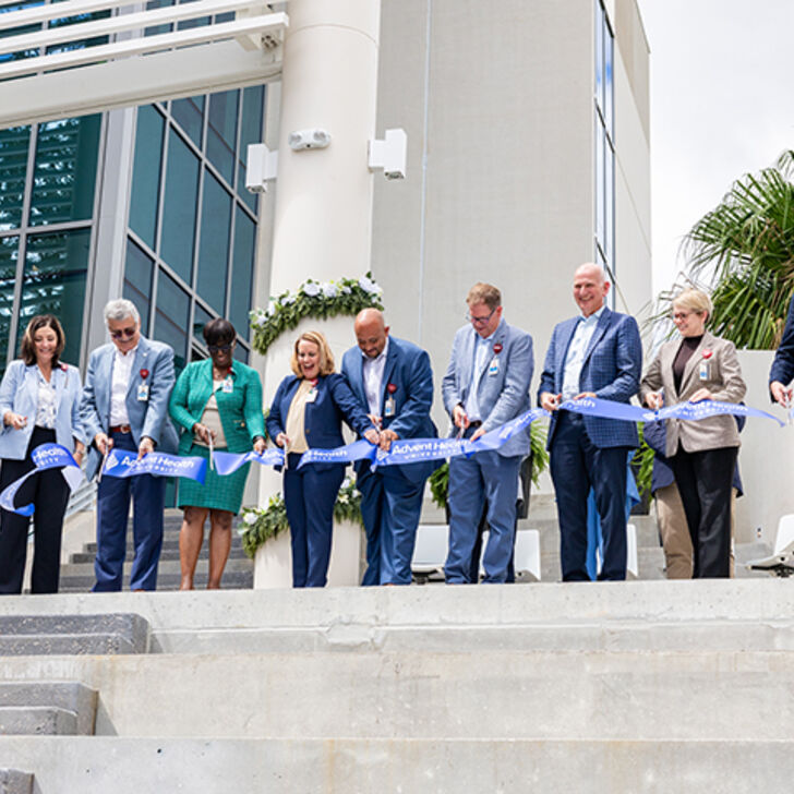 AHU and AdventHealth leaders cutting the ribbon at the opening of AHU's new simulation center
