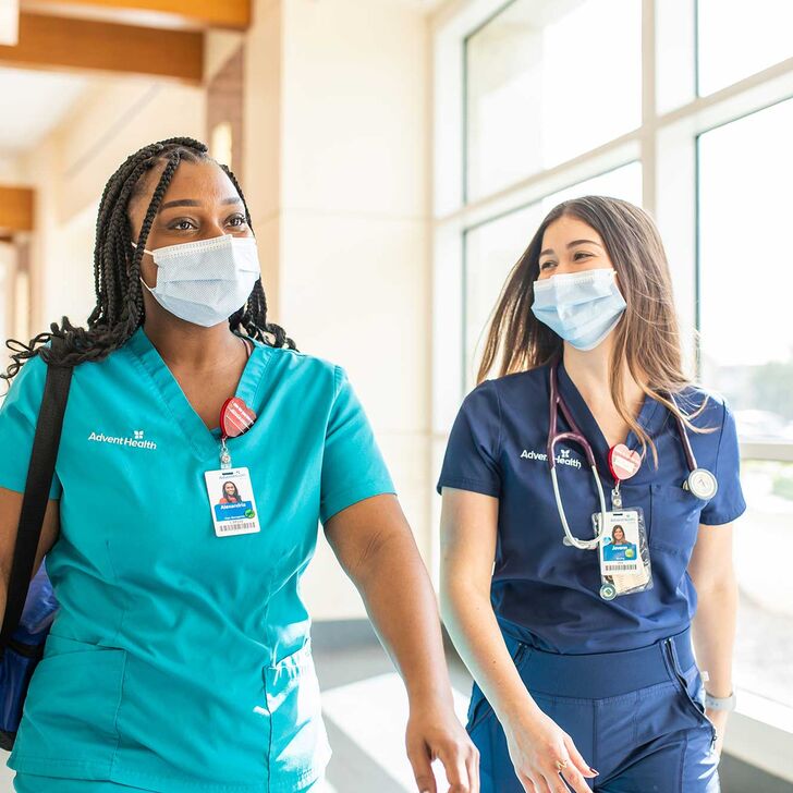 Nurses walking down a hallway