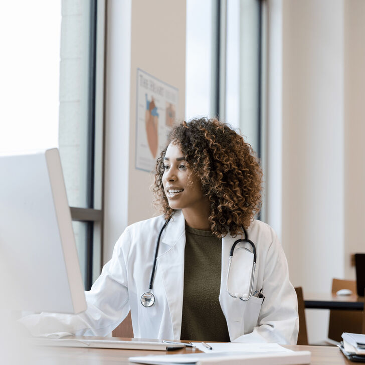 Female Physician using computer