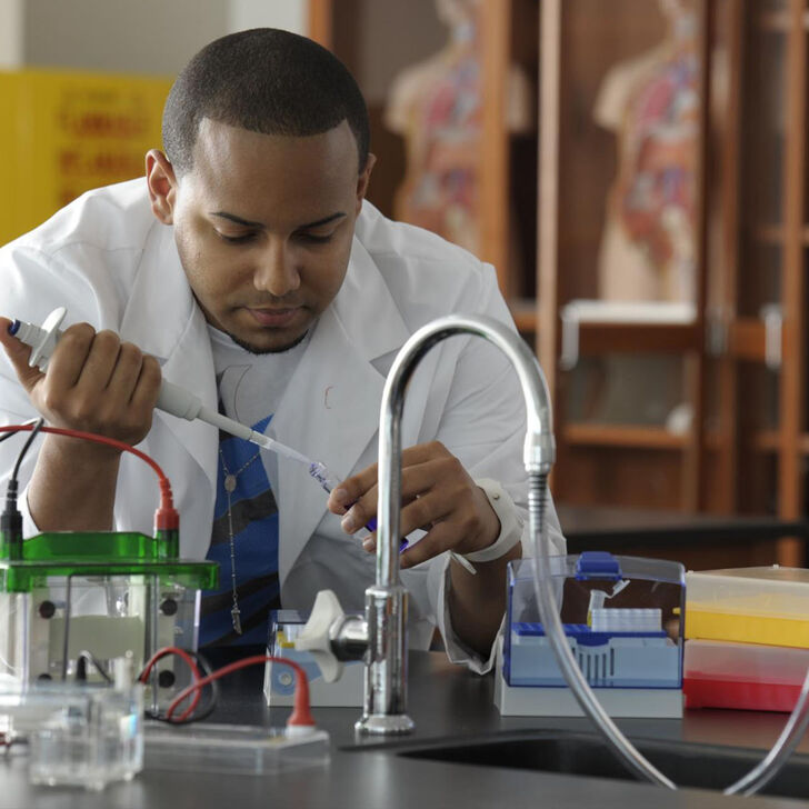 A student conducting a chemistry experiment