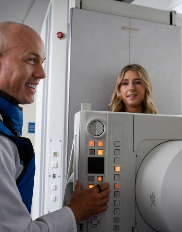 Professor and student in radiography lab