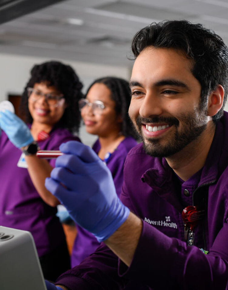 students in lab smiling